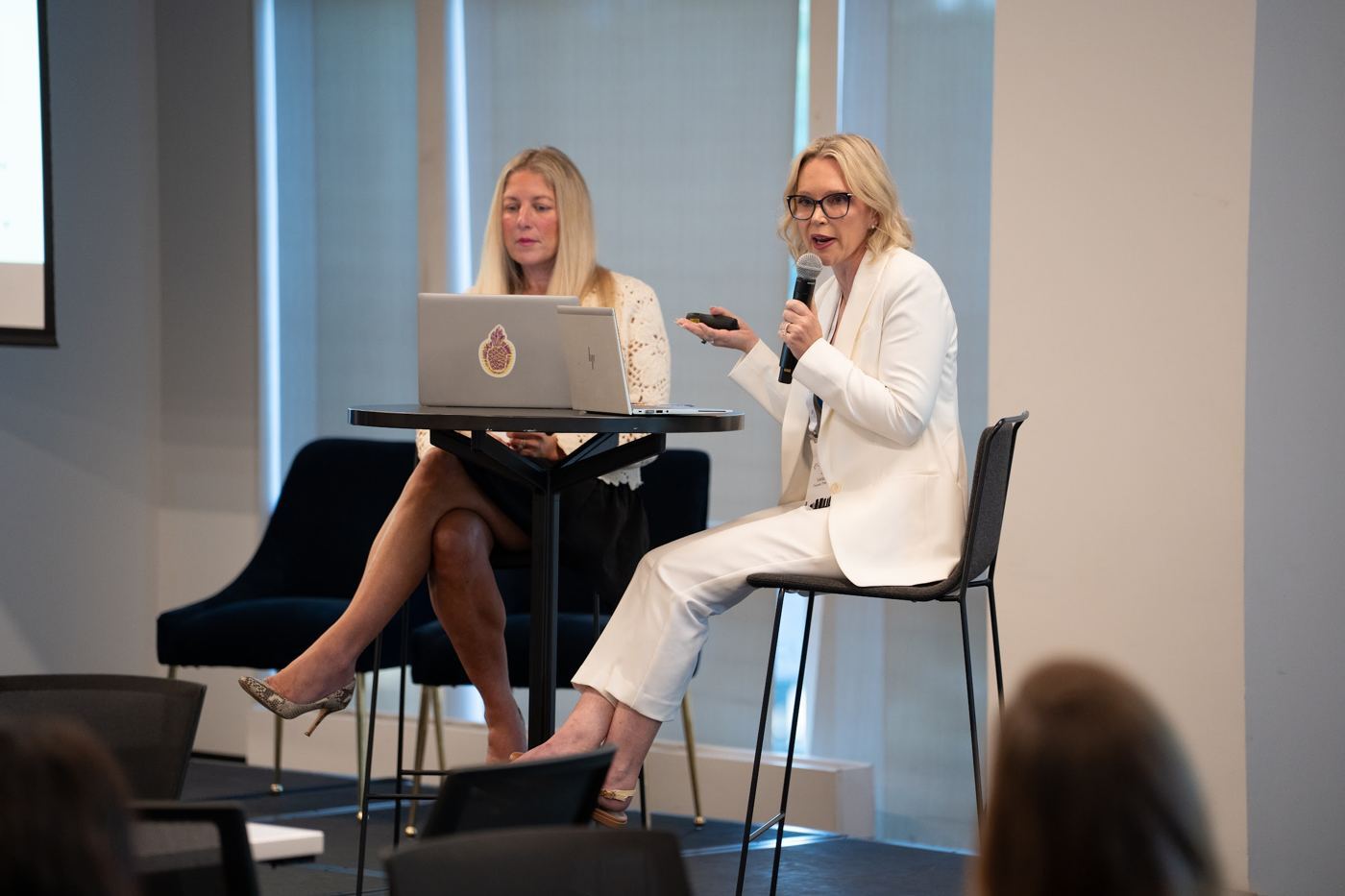 Two speakers presenting a session